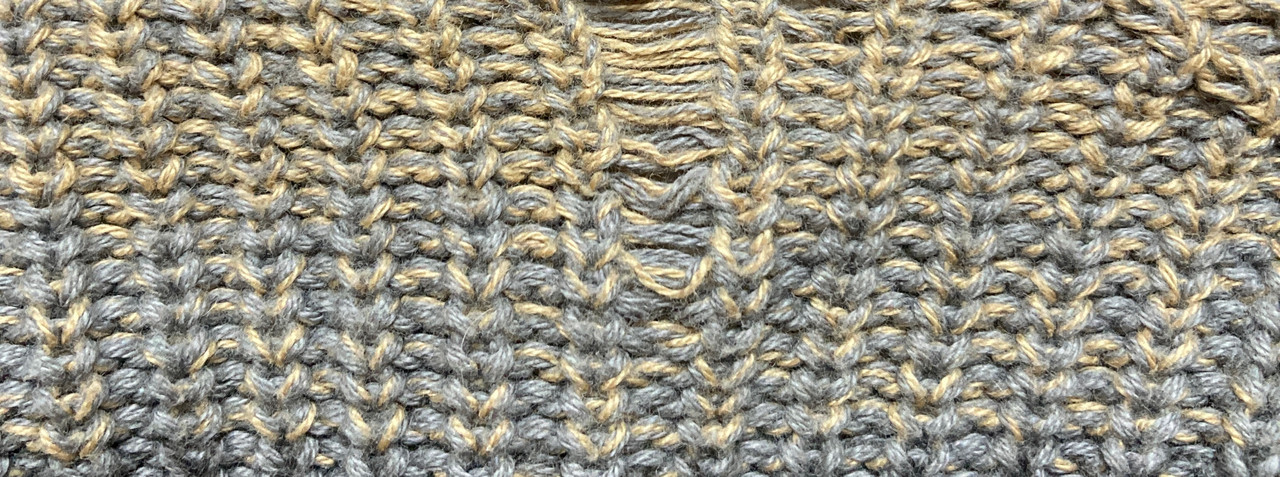 Laufmasche in Strickware