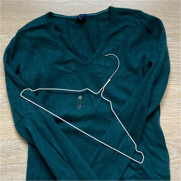 Pullover mit Kleiderbügel